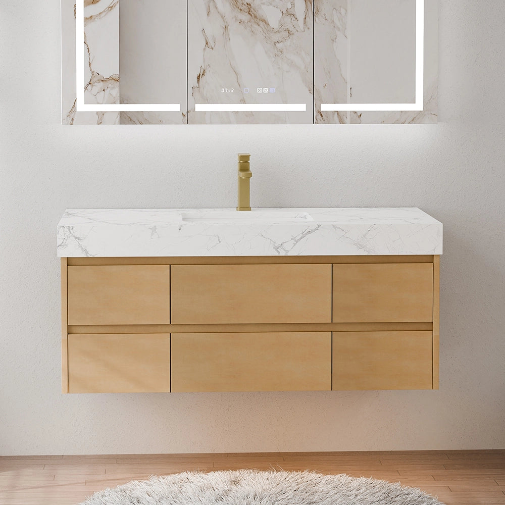 48 Inch Wall Mounted Double Bathroom Vanity featuring light wood cabinetry with six drawers, engineered stone countertop with white marble veining, and a brass finish faucet; paired with a backlit marble-framed mirror in a modern bathroom setting with light gray walls and a plush white rug.