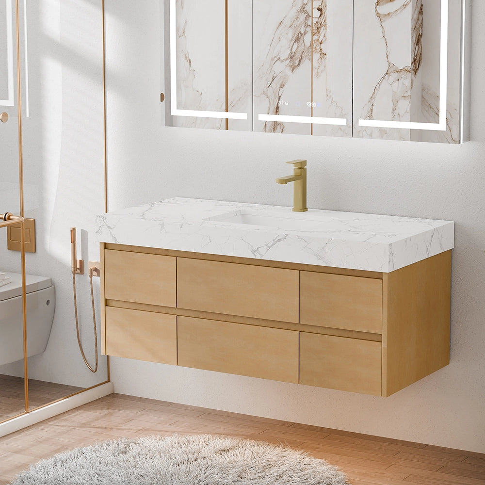 48 Inch Wall Mounted Double Bathroom Vanity with light oak wood cabinetry (six soft-close drawers), engineered stone countertop with white marble veining, brass single-hole faucet; installed in a modern bathroom with marble backlit mirror, light gray walls, wooden flooring and white fluffy rug, showcasing sleek floating design and contemporary aesthetic.