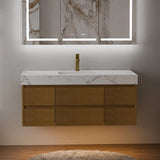 48 Inch Wall Mounted Double Bathroom Vanity in a straight-on front view, featuring dark wood six-drawer cabinetry and an engineered stone countertop with bold white marble veining; paired with a matte black single-hole faucet and a large marble-framed LED backlit mirror with warm ambient lighting, set against a light gray marble-patterned wall with a fluffy white rug on wooden flooring, showcasing a sleek and luxurious modern bathroom aesthetic.