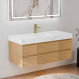 48 Inch Wall Mounted Double Bathroom Vanity in a three-quarter side front view, featuring light maple wood six-drawer floating cabinetry and a crisp white engineered stone countertop with subtle marble veining; accented with a brass gooseneck faucet and a large marble-framed LED backlit mirror, set in a bright modern bathroom with light gray walls, wooden flooring and a white fluffy rug, emphasizing the vanity’s streamlined silhouette and natural wood finish.